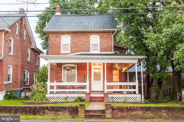 850 N Reading Ave, Boyertown, PA 19512 - view of front facade featuring covered porch, brick siding, and a shingled roof