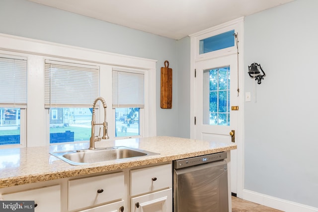 850 N Reading Ave, Boyertown, PA 19512 - kitchen with dishwasher, plenty of natural light, white cabinetry, and light stone countertops