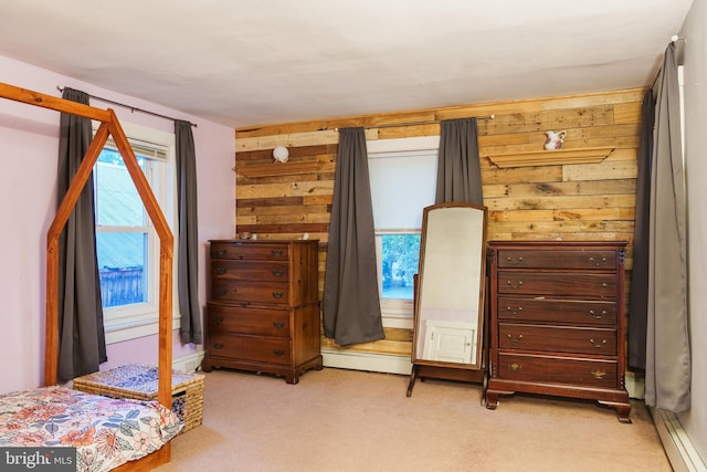 850 N Reading Ave, Boyertown, PA 19512 - bedroom with light carpet, wood walls, and baseboard heating