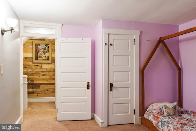 850 N Reading Ave, Boyertown, PA 19512 - bedroom with light colored carpet and wood walls