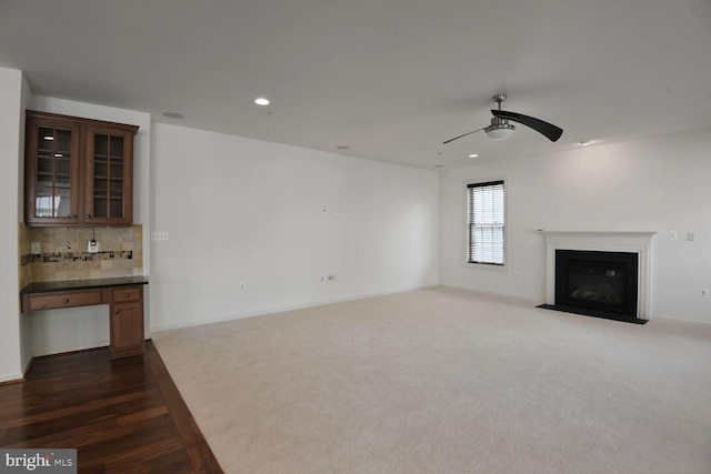 13319 Moonlight Trail Dr, Silver Spring, MD 20906 - unfurnished living room featuring ceiling fan, a fireplace with flush hearth, dark carpet, recessed lighting, and dark wood-style floors