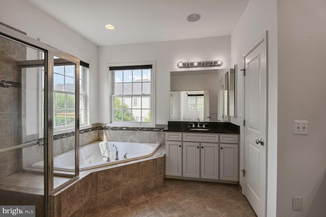 13319 Moonlight Trail Dr, Silver Spring, MD 20906 - bathroom featuring vanity, a bath, an enclosed shower, recessed lighting, and tile patterned floors