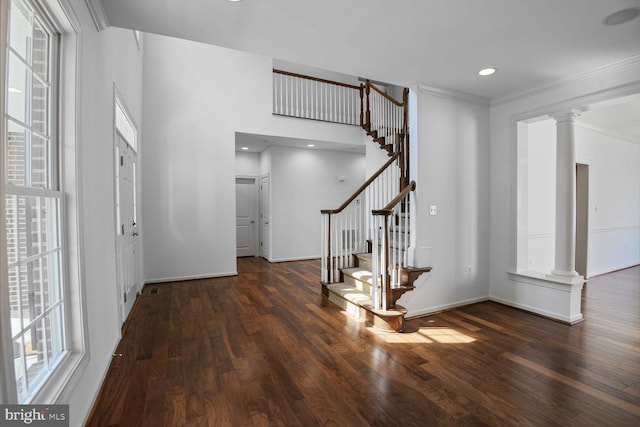 13319 Moonlight Trail Dr, Silver Spring, MD 20906 - entryway featuring ornate columns, plenty of natural light, wood finished floors, crown molding, and recessed lighting