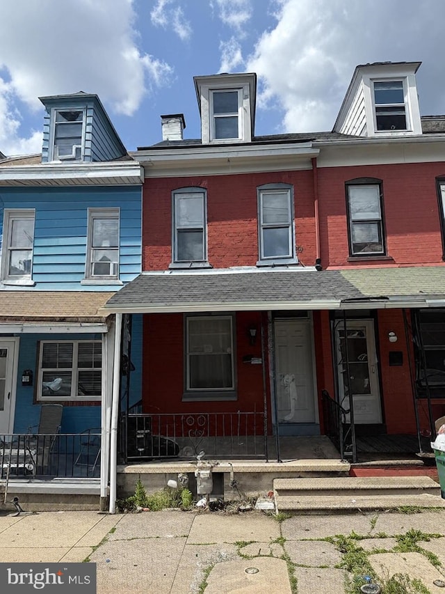 1631 Cotton St, Reading, PA 19606 - townhome / multi-family property with covered porch