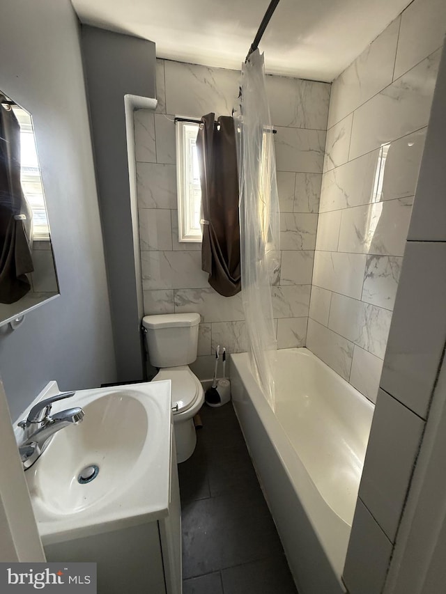 1631 Cotton St, Reading, PA 19606 - bathroom with plenty of natural light, tile walls, shower / bath combo with shower curtain, and vanity