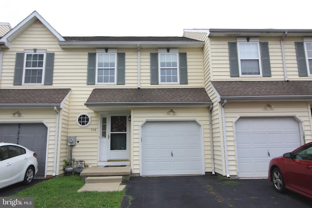 508 Red Bud Ct, Wilmington, DE 19805 - multi unit property with a garage, driveway, and a shingled roof