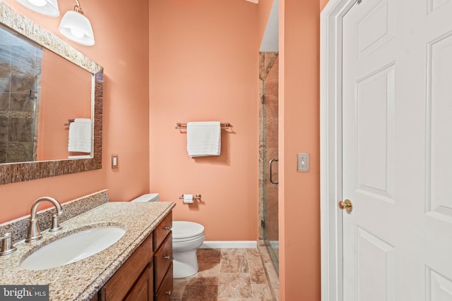 913 Rolfe Pl, Alexandria, VA 22314 - bathroom featuring a stall shower, vanity, and stone finish flooring