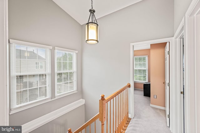 913 Rolfe Pl, Alexandria, VA 22314 - hallway with light colored carpet, an upstairs landing, and high vaulted ceiling