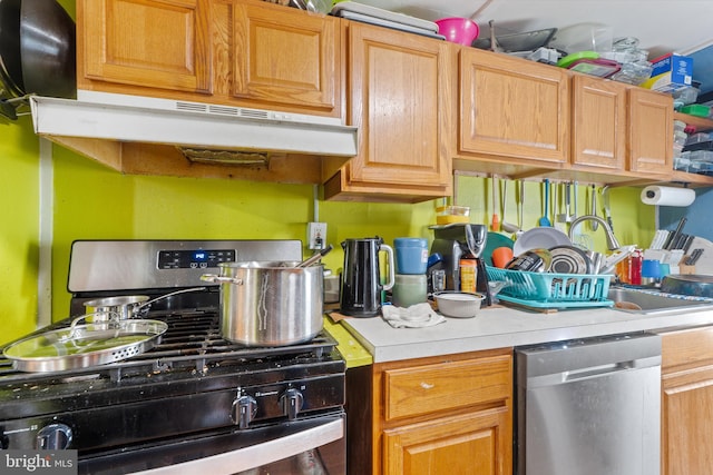 127 Schooley St, Moorestown, NJ 08057 - kitchen with appliances with stainless steel finishes, under cabinet range hood, and light countertops