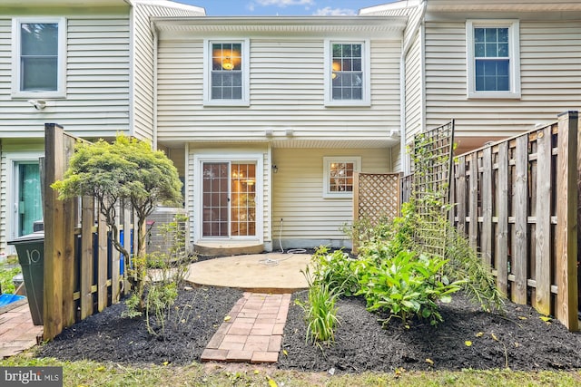 10 Suncroft Ct, Silver Spring, MD 20904 - rear view of property featuring a fenced backyard and a patio