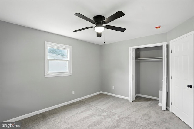 1415 Larch Rd, Severn, MD 21144 - unfurnished bedroom with carpet, a closet, and a ceiling fan