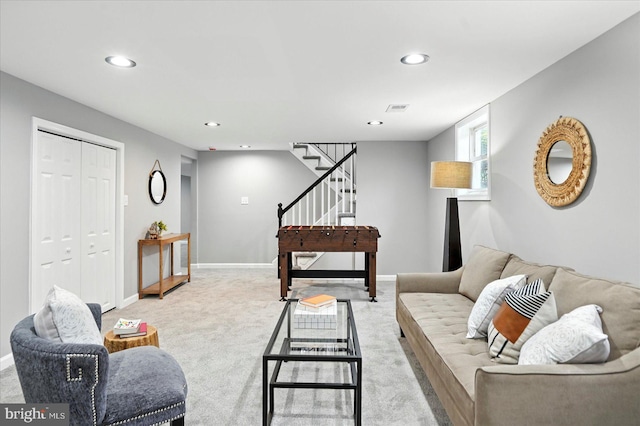 1415 Larch Rd, Severn, MD 21144 - living area with light carpet, stairway, and recessed lighting