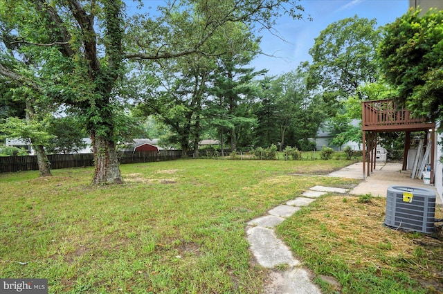 1415 Larch Rd, Severn, MD 21144 - view of yard featuring a wooden deck and a patio