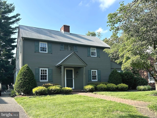 311 Rhoads Ave, Haddonfield, NJ 08033 - colonial inspired home with a front lawn and a chimney