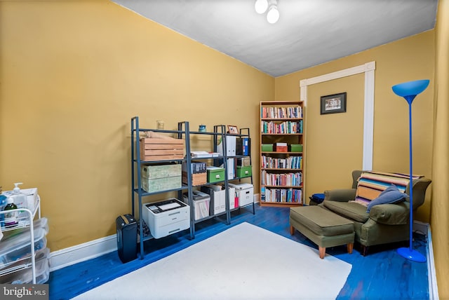 619 E 36th St E, Baltimore, MD 21218 - living area featuring wood finished floors and baseboards