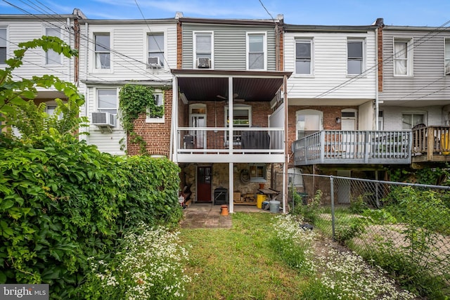 619 E 36th St E, Baltimore, MD 21218 - rear view of property featuring brick siding and cooling unit