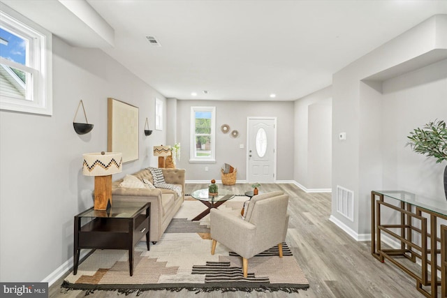 3912 Fernhill Ave, Baltimore, MD 21215 - living area with light wood finished floors and baseboards