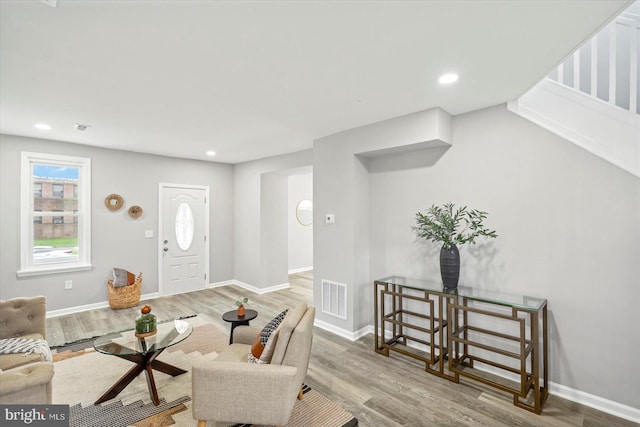 3912 Fernhill Ave, Baltimore, MD 21215 - living area with wood finished floors and recessed lighting