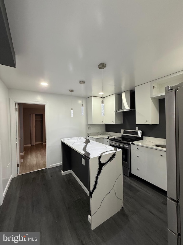 331 Spring Garden St, Reading, PA 19602 - kitchen with appliances with stainless steel finishes, wall chimney range hood, white cabinets, dark wood-style flooring, and recessed lighting