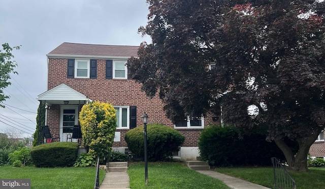 1002 Agnew Dr Unit 1, Drexel Hill, PA 19026 - view of front of home featuring brick siding and a front lawn