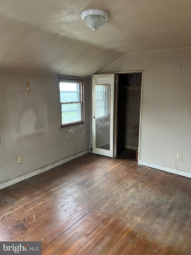 1002 Agnew Dr Unit 1, Drexel Hill, PA 19026 - unfurnished bedroom with vaulted ceiling, hardwood / wood-style flooring, and a closet