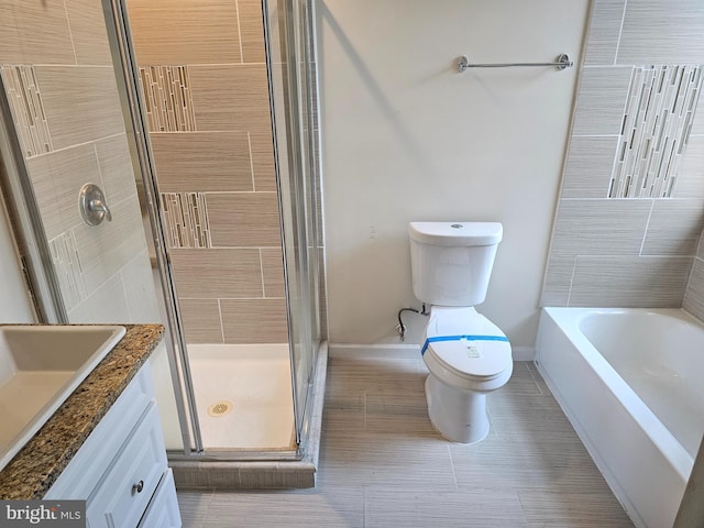1427 E Eager St, Baltimore, MD 21205 - full bathroom with tiled shower, vanity, a bathtub, and tile patterned floors