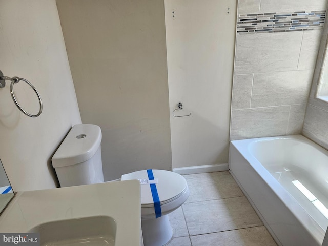 1427 E Eager St, Baltimore, MD 21205 - full bathroom with a tub and tile patterned flooring