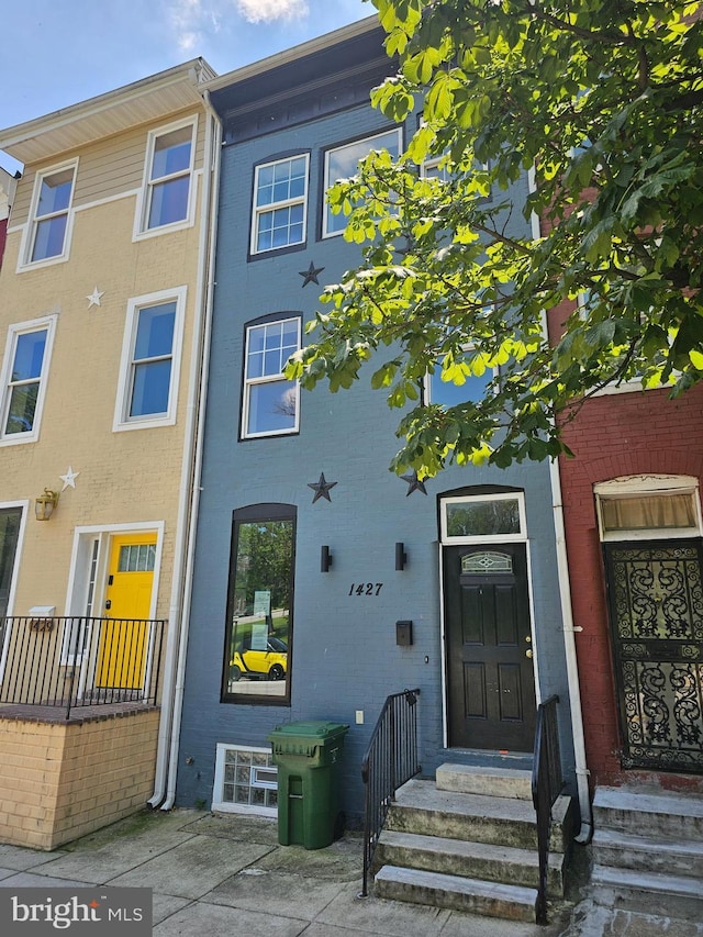 1427 E Eager St, Baltimore, MD 21205 - back of house featuring brick siding