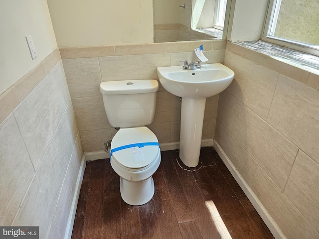 1427 E Eager St, Baltimore, MD 21205 - half bath with wood finished floors and tile walls