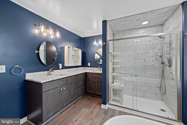 20 Bee Tree Mill Ct, Parkton, MD 21120 - full bathroom with double vanity, a shower stall, and wood finished floors