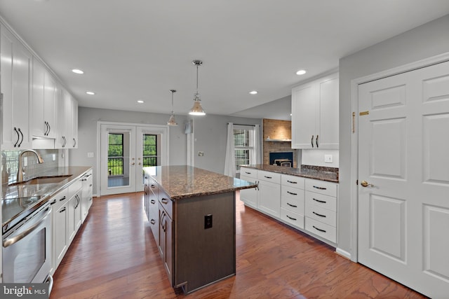 20 Bee Tree Mill Ct, Parkton, MD 21120 - kitchen with appliances with stainless steel finishes, recessed lighting, dark stone countertops, white cabinets, and french doors