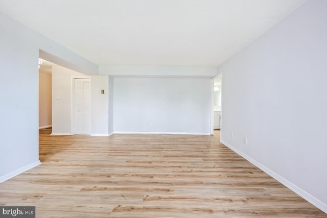 1836 Metzerott Rd Unit 419, Hyattsville, MD 20783 - unfurnished room with wood finished floors and baseboards