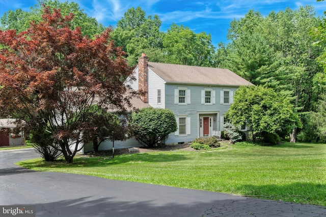 213 Willits Way, Glen Mills, PA 19342 - colonial home featuring a chimney and a front yard