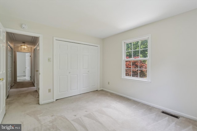 213 Willits Way, Glen Mills, PA 19342 - unfurnished bedroom featuring attic access, carpet flooring, and a closet