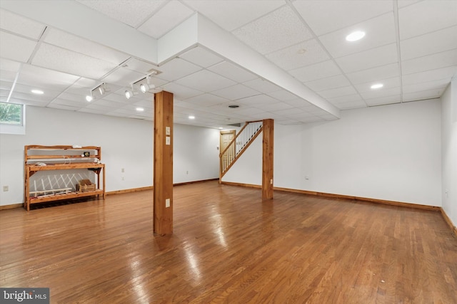 213 Willits Way, Glen Mills, PA 19342 - basement with a drop ceiling, stairs, and wood finished floors