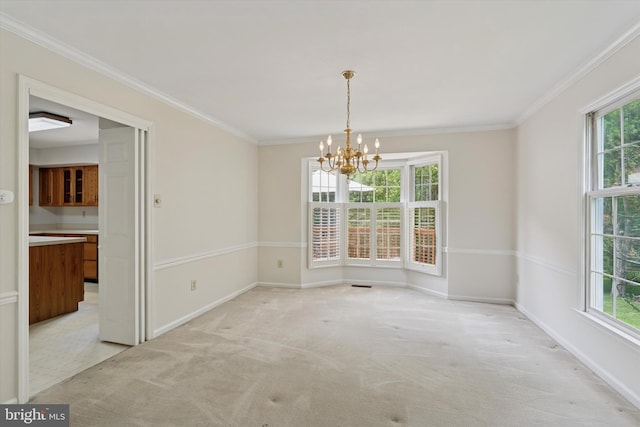 213 Willits Way, Glen Mills, PA 19342 - unfurnished room with healthy amount of natural light, a chandelier, crown molding, and light carpet