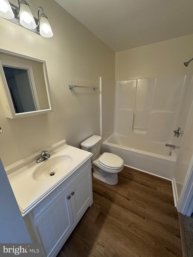 5825 Ebenezer Rd, White Marsh, MD 21162 - bathroom featuring wood finished floors, vanity, and shower / bath combination