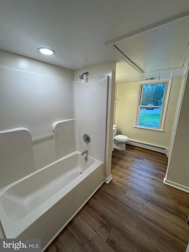 5825 Ebenezer Rd, White Marsh, MD 21162 - bathroom featuring a baseboard radiator, wood finished floors, shower / washtub combination, and recessed lighting