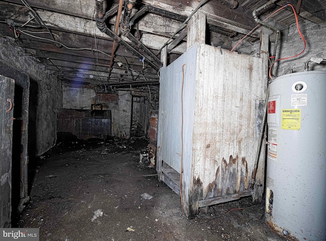1626 N Smallwood St, Baltimore, MD 21216 - unfinished basement featuring water heater