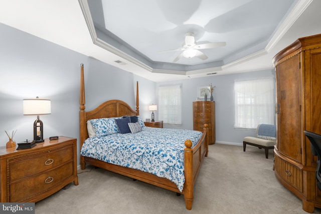 42 Ruddy Duck Ln, Bridgeville, DE 19933 - bedroom featuring a tray ceiling, light carpet, and a ceiling fan