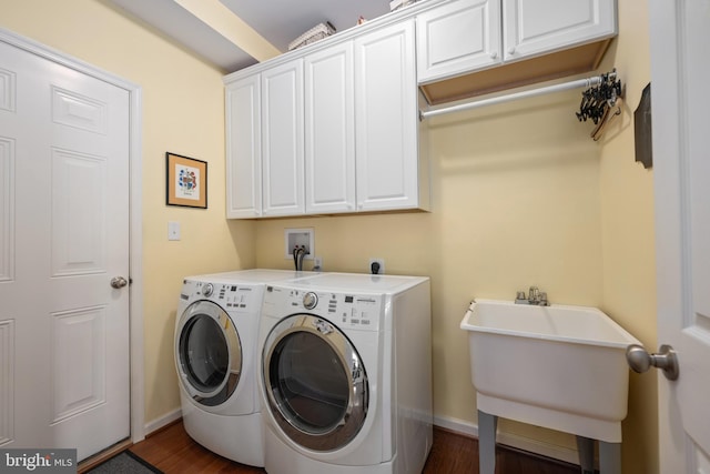 42 Ruddy Duck Ln, Bridgeville, DE 19933 - laundry room with cabinet space, independent washer and dryer, and dark wood-type flooring