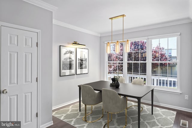 6692 Ordsall St, Alexandria, VA 22315 - dining area with dark wood-style floors and crown molding