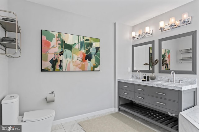 6692 Ordsall St, Alexandria, VA 22315 - bathroom with double vanity and toilet