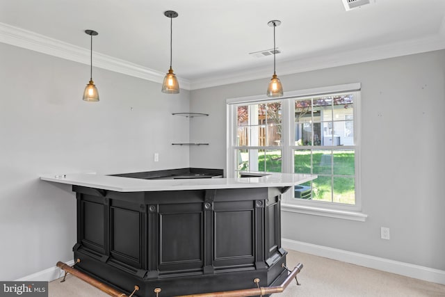 6692 Ordsall St, Alexandria, VA 22315 - kitchen with light carpet, dark cabinets, ornamental molding, pendant lighting, and light countertops