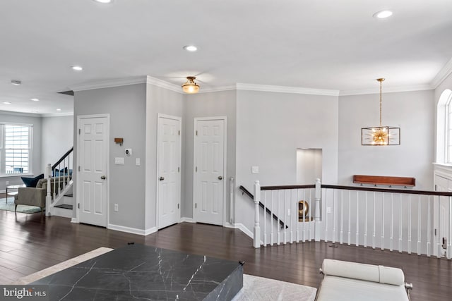 6692 Ordsall St, Alexandria, VA 22315 - entryway with wood finished floors, crown molding, recessed lighting, and a chandelier