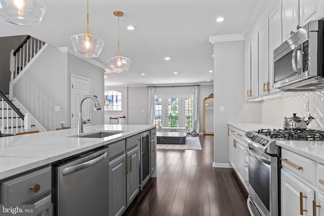 6692 Ordsall St, Alexandria, VA 22315 - kitchen featuring stainless steel appliances, gray cabinetry, recessed lighting, white cabinets, and light stone countertops