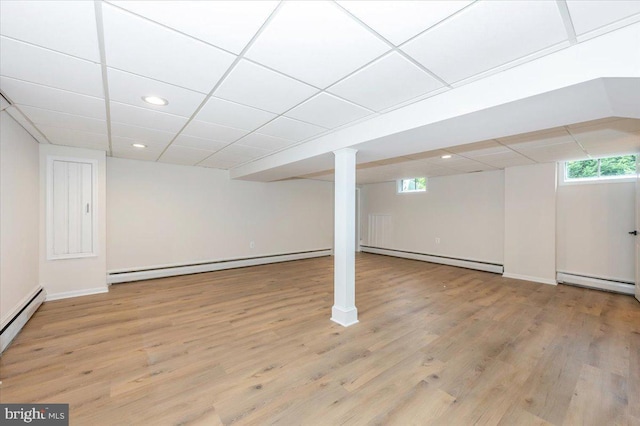 1802 Ridge Rd, Westminster, MD 21157 - basement featuring baseboard heating, a baseboard heating unit, plenty of natural light, a drop ceiling, and recessed lighting