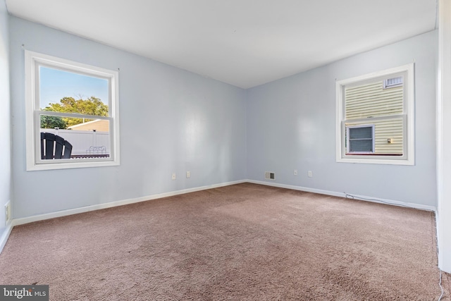 12 Orchard St, Keansburg, NJ 07734 - carpeted spare room featuring baseboards