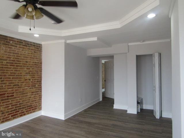 16 Gilmor St, Baltimore, MD 21223 - unfurnished room with brick wall, a ceiling fan, ornamental molding, wood finished floors, and recessed lighting