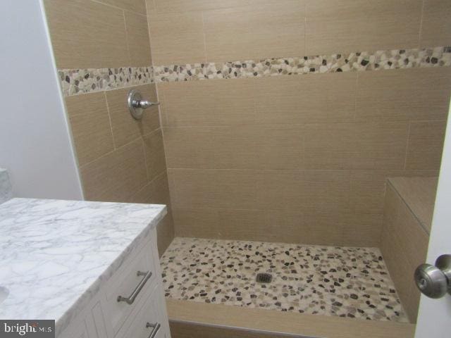 16 Gilmor St, Baltimore, MD 21223 - full bathroom with tiled shower and vanity